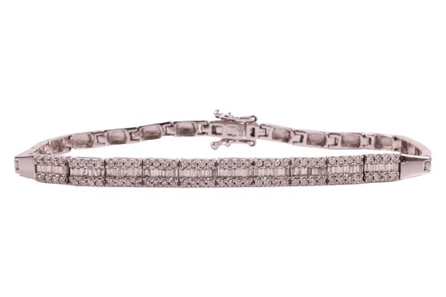 Lot 47 - A diamond-set link bracelet, comprising a...