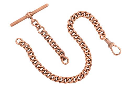 Lot A curb link bracelet along with a T-bar; the...