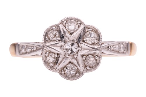 Lot A Diamond ring of floral design, estimated...