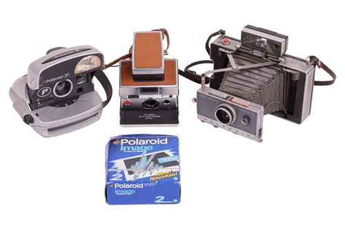 Lot 403 - Three Polaroid Cameras c.1960s-1990s as used...