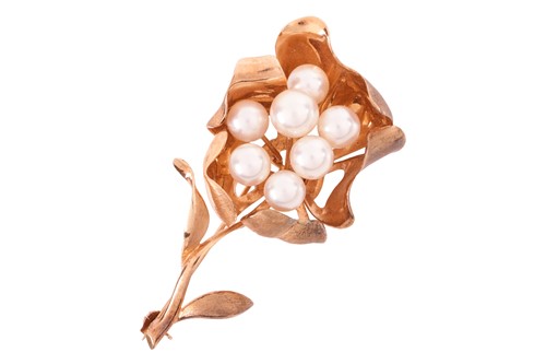 Lot A pearl-set floral brooch, of a stylised...