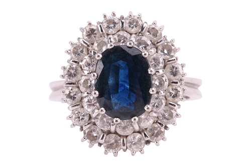 Lot A sapphire and diamond cluster ring, centred...