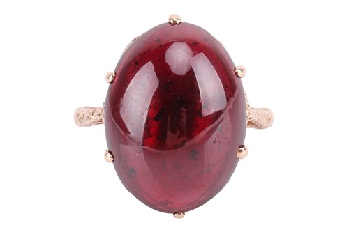 Lot A garnet 'carbuncle' dress ring in 9ct gold,...