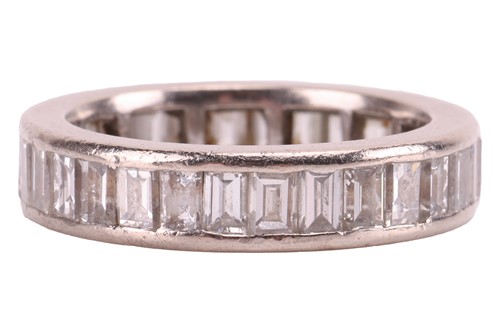 Lot 40 - A diamond-set eternity ring, with an estimated...