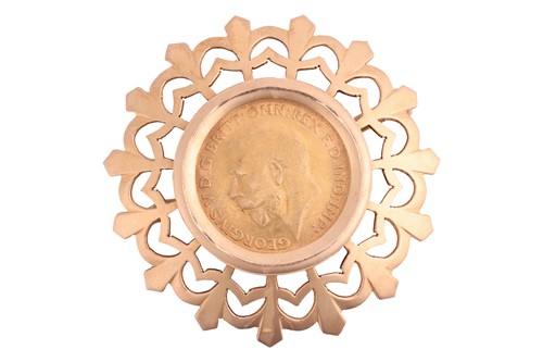 Lot 96 - A George V half sovereign brooch, dated 1911,...