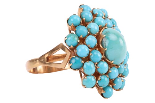 Lot 16 - A turquoise cluster dress ring, the central...