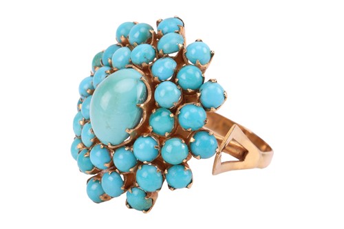Lot 16 - A turquoise cluster dress ring, the central...