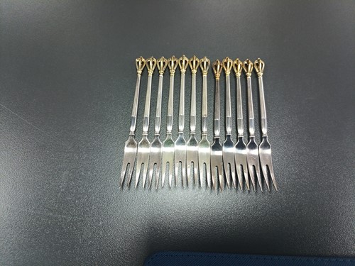 Lot 41 - A set of twelve Danish teaspoons and cake...