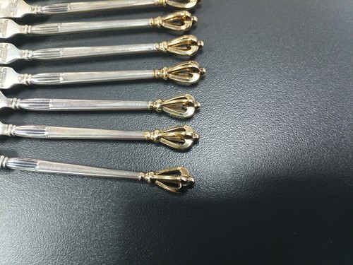 Lot 41 - A set of twelve Danish teaspoons and cake...