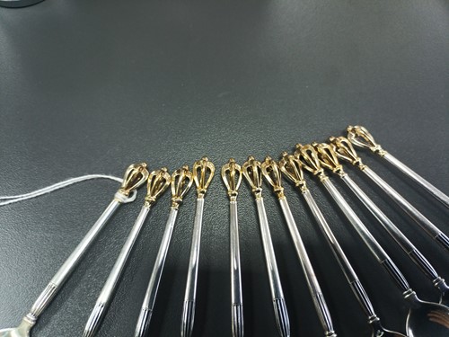 Lot 41 - A set of twelve Danish teaspoons and cake...