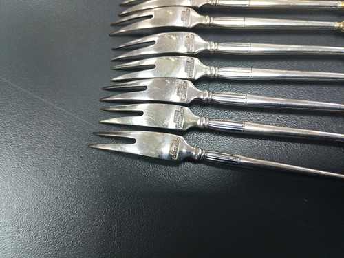 Lot 41 - A set of twelve Danish teaspoons and cake...