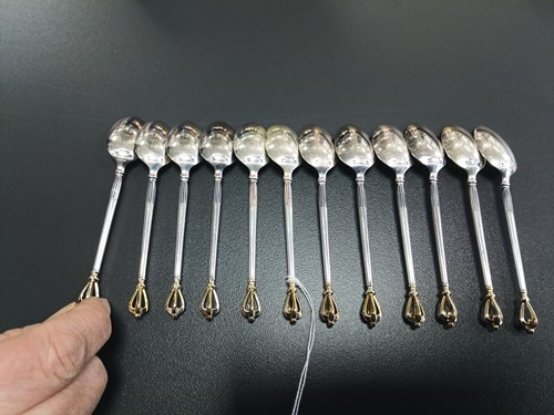 Lot 41 - A set of twelve Danish teaspoons and cake...