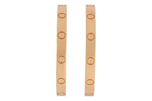 Lot Cartier - a pair of Love earrings in 18ct gold,...