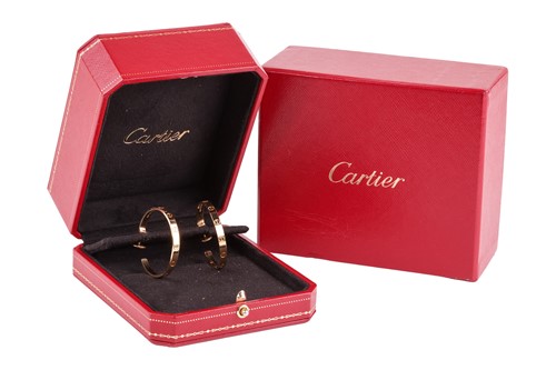 Lot 169 - Cartier - a pair of 'LOVE' earrings in 18ct...