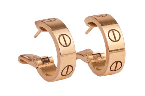 Lot Cartier - a pair of Love earrings in 18ct...