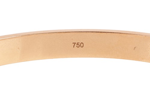 Lot Cartier - a 'LOVE' bangle in 18ct yellow gold,...