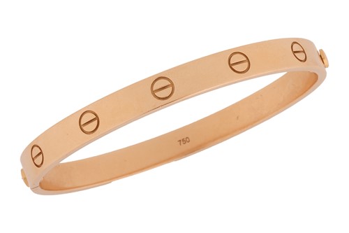 Lot Cartier - a 'LOVE' bangle in 18ct yellow gold,...