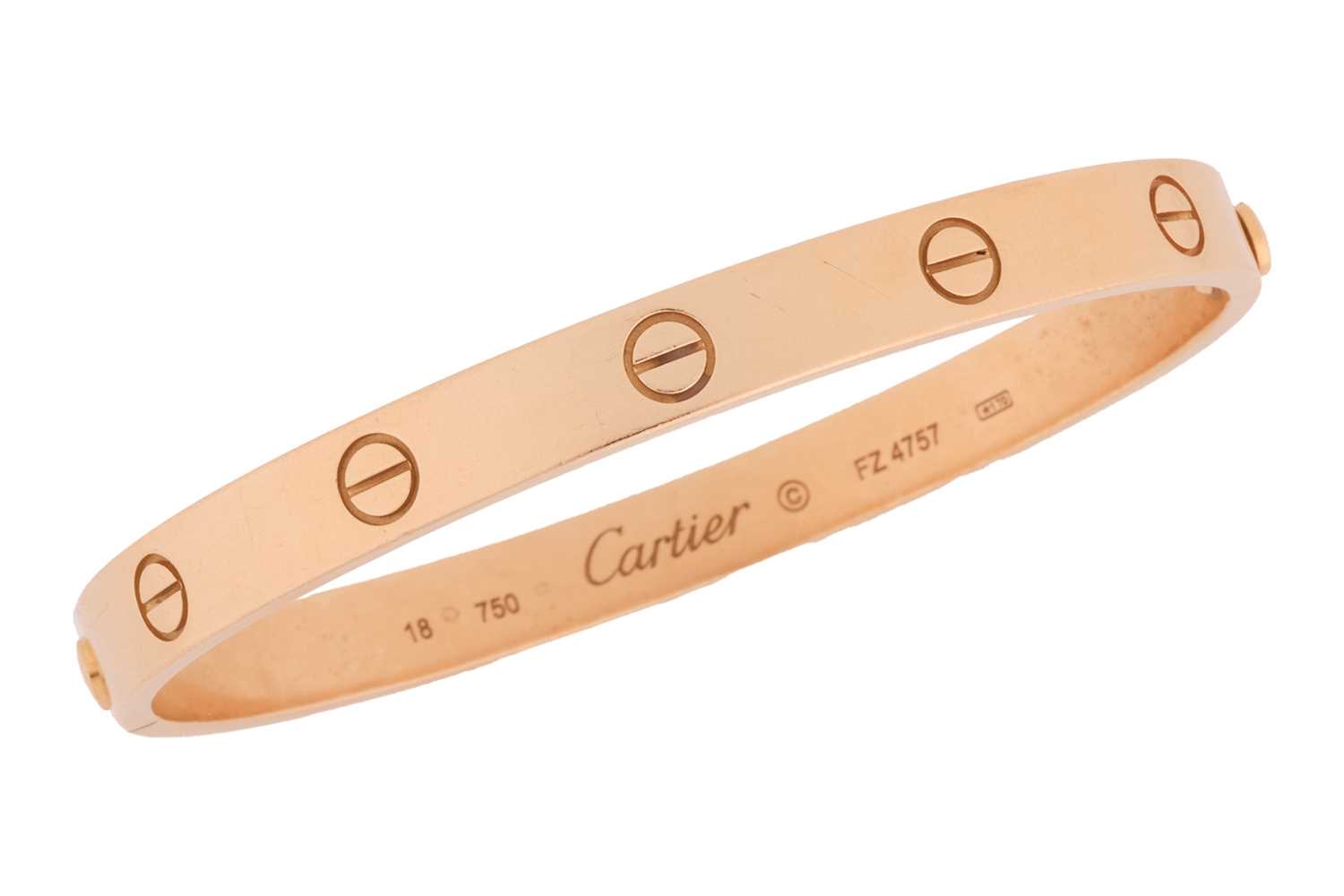 Lot Cartier - a 'LOVE' bangle in 18ct yellow gold,...