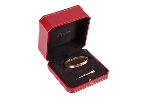 Lot Cartier - a 'LOVE' bangle in 18ct yellow gold,...