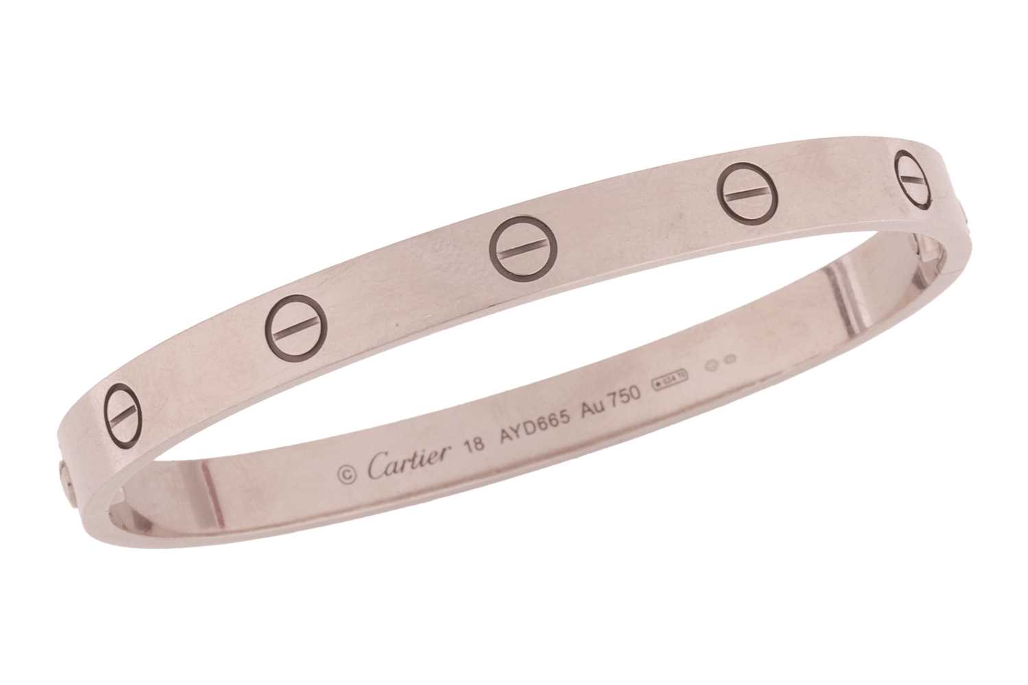 Lot 182 - Cartier - a 'LOVE' bangle in 18ct white gold,...