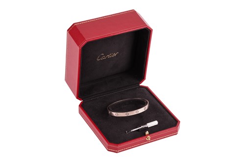 Lot 182 - Cartier - a 'LOVE' bangle in 18ct white gold,...