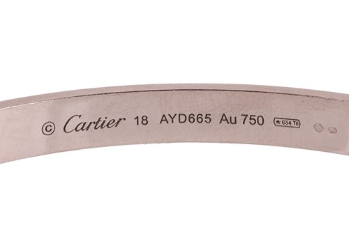 Lot 182 - Cartier - a 'LOVE' bangle in 18ct white gold,...