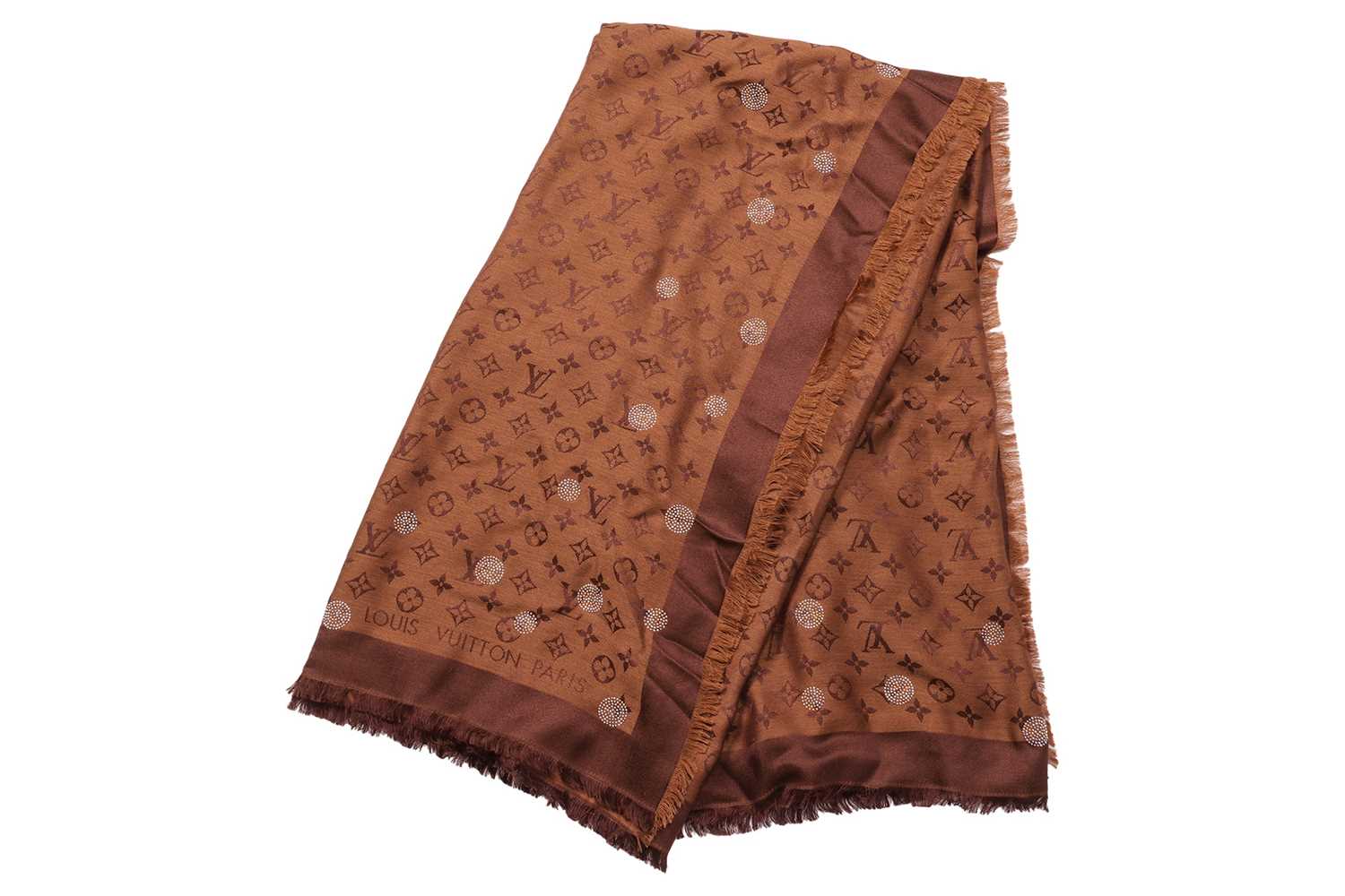 Lot 11 - Louis Vuitton - a large reverse dots denim...