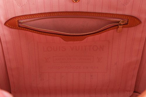 Lot 181 - Louis Vuitton - a Neverfull MM tote bag in...