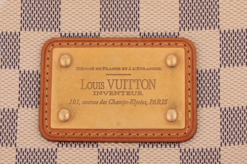 Lot 182 - Louis Vuitton - an Eva clutch bag in Damier...