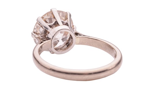 Lot 229 - An old-cut diamond solitaire ring, claw-set...