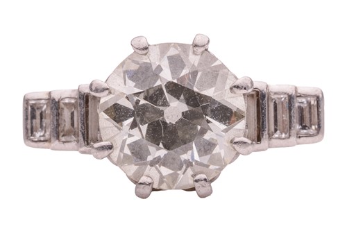 Lot 243 - An old-cut diamond dress ring, centred with an...