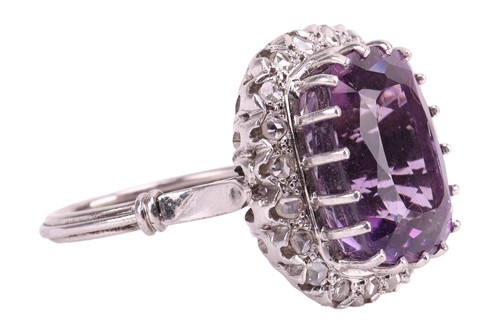 Lot 29 - An amethyst and diamond dress ring, the claw...