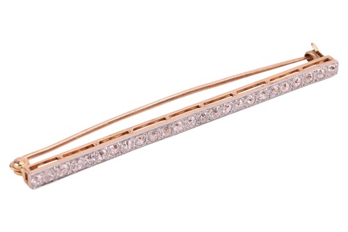 Lot 27 - A diamond set bar brooch, pavé-set with twenty-...