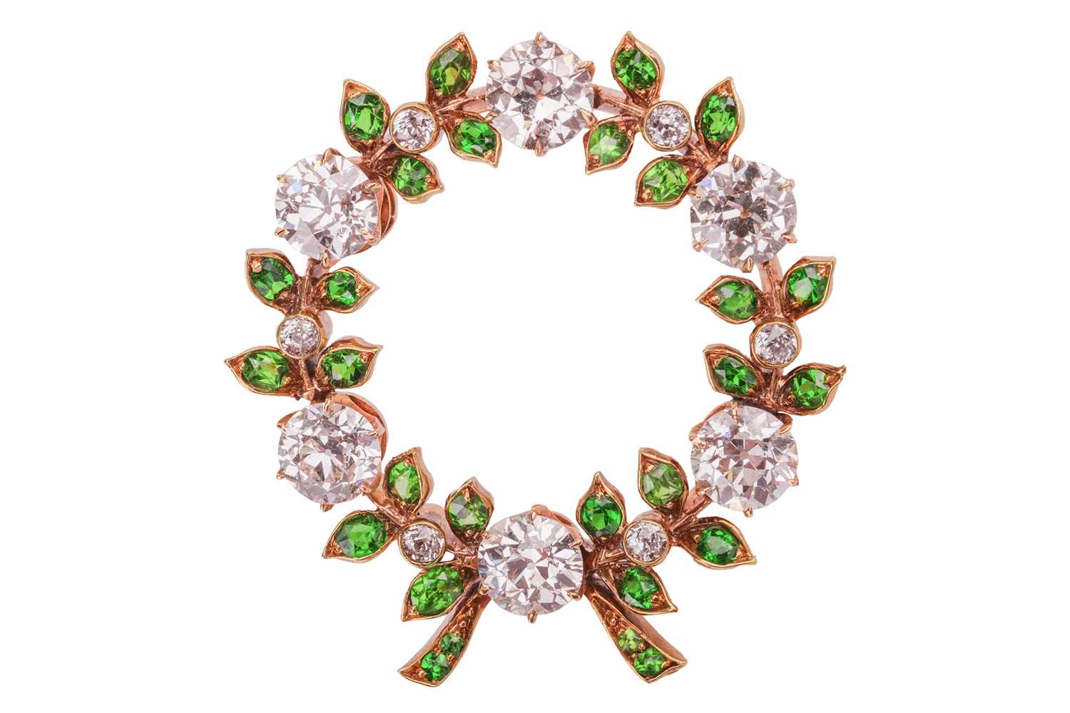 Lot 222 - Marcus & Co. - a diamond and demantoid garnet...