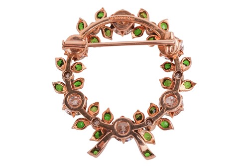 Lot 222 - Marcus & Co. - a diamond and demantoid garnet...