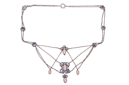 Lot 7 - An Art Nouveau moonstone and opal swag...