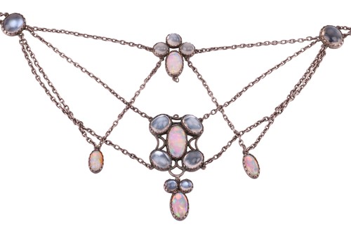 Lot 7 - An Art Nouveau moonstone and opal swag...