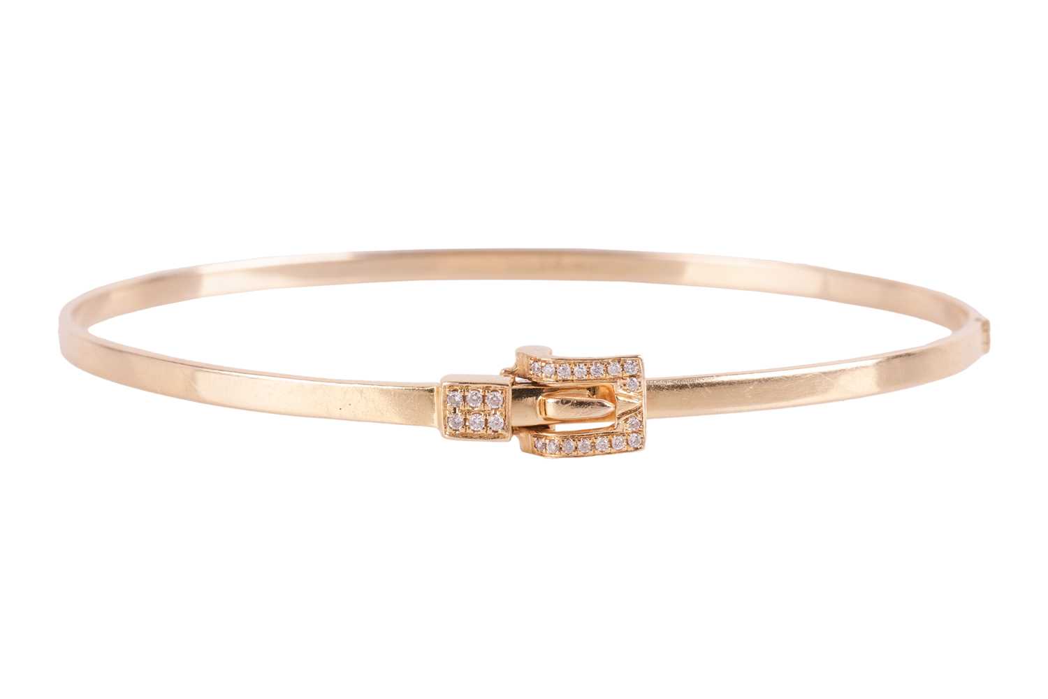 Lot 94 - A diamond-set hinged bangle in 18ct gold, of...
