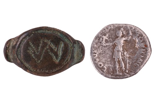 Lot 225 - A Roman coin and a Roman bronze ring; Trajan...