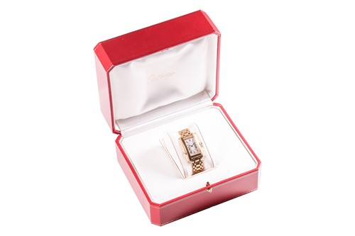 Lot 265 - Cartier Tank Americaine Model: W26015K2...