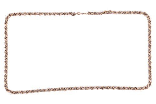 Lot 202 - A twisted rope chain, intertwined with a box...