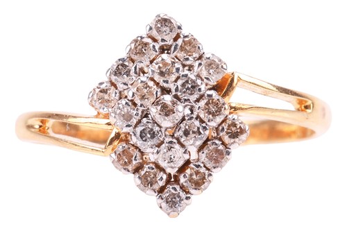 Lot 24 - A diamond cluster ring, featuring a cluster of...