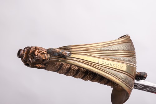Lot 166 - A Royal Navy 1822 type officers dress sword...