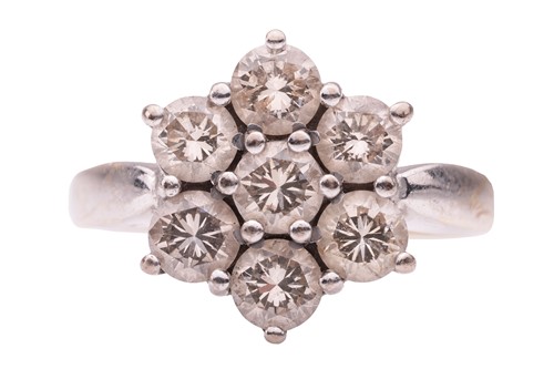 Lot 38 - A diamond-set floral cluster ring in 18ct...