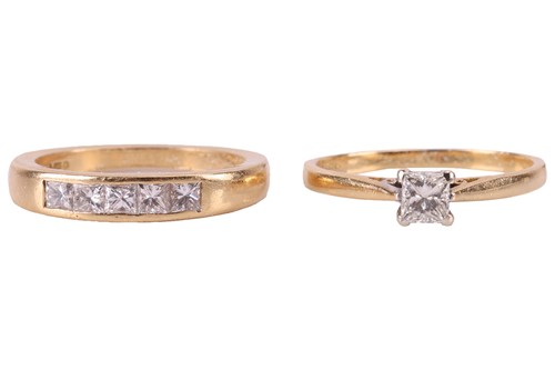 Lot 111 - A set of two diamond rings; comprising a...