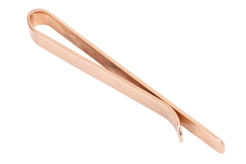 Lot 19 - Cartier - a tie clip, in form of a plain...