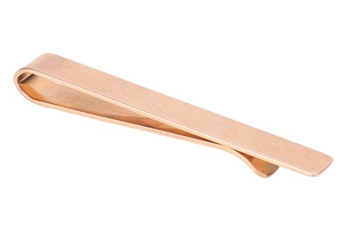 Lot 19 - Cartier - a tie clip, in form of a plain...