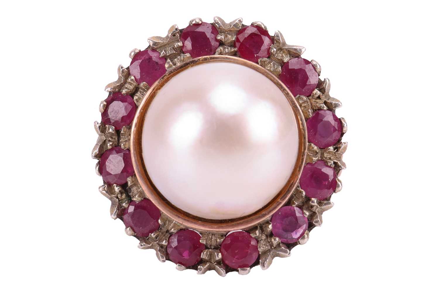 Lot 122 - A Mabé pearl and ruby cocktail ring, centred...