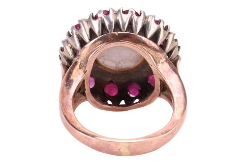 Lot 122 - A Mabé pearl and ruby cocktail ring, centred...