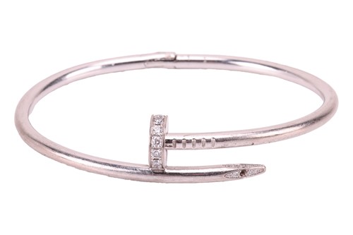 Lot 126 - Cartier - a 'Juste un Clou' diamond-set...